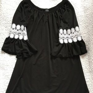 Black top with white lace accent